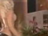 Pamela Anderson strips on live TV