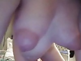  hot milf oils her big tits and shaved pussy 
